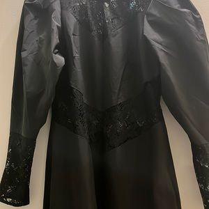 Medium H&M black puffy sleeve floor lengtj dress with lace inserts.
